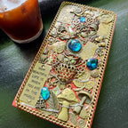 Isolde Bluevale – Handmade Magic Journal with Blue Gems, Owl, Rose, Postcard and Mushroom Charms. BrassBound Pages